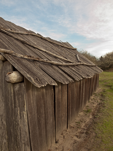 Chinook plankhouse made from weathered cedar boards