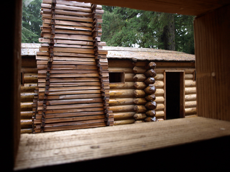Looking out a log cabin window
